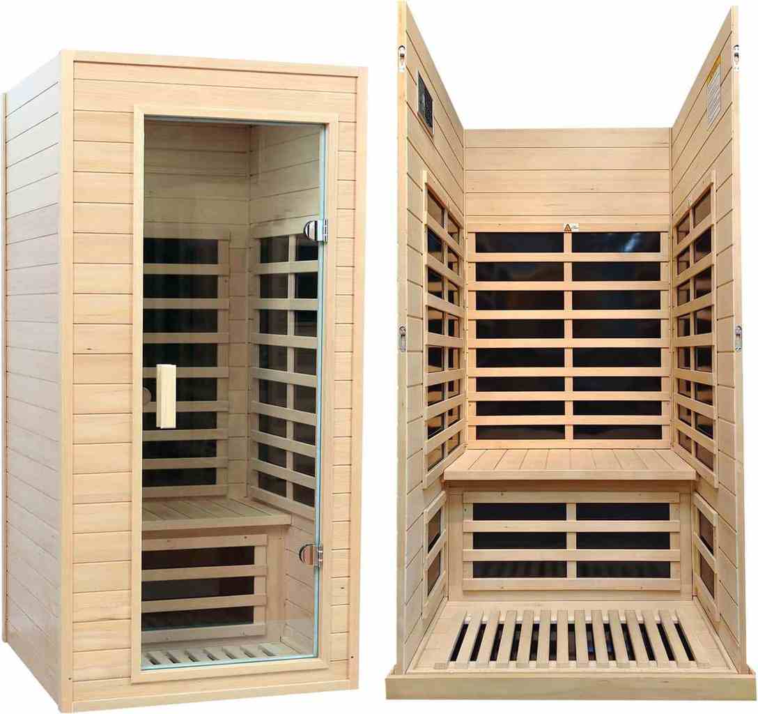 Infrared sauna with glass door open, showing carbon heater panels, bench and interior lighting